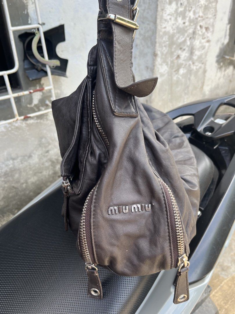 Miu miu messenger (Category: Cross-body Bags) located in Tacloban City. Submitted by luxbag_phhh (Listing ID 1461338663, Image 2). Description: From japan box Sign of use Check detailed pics .