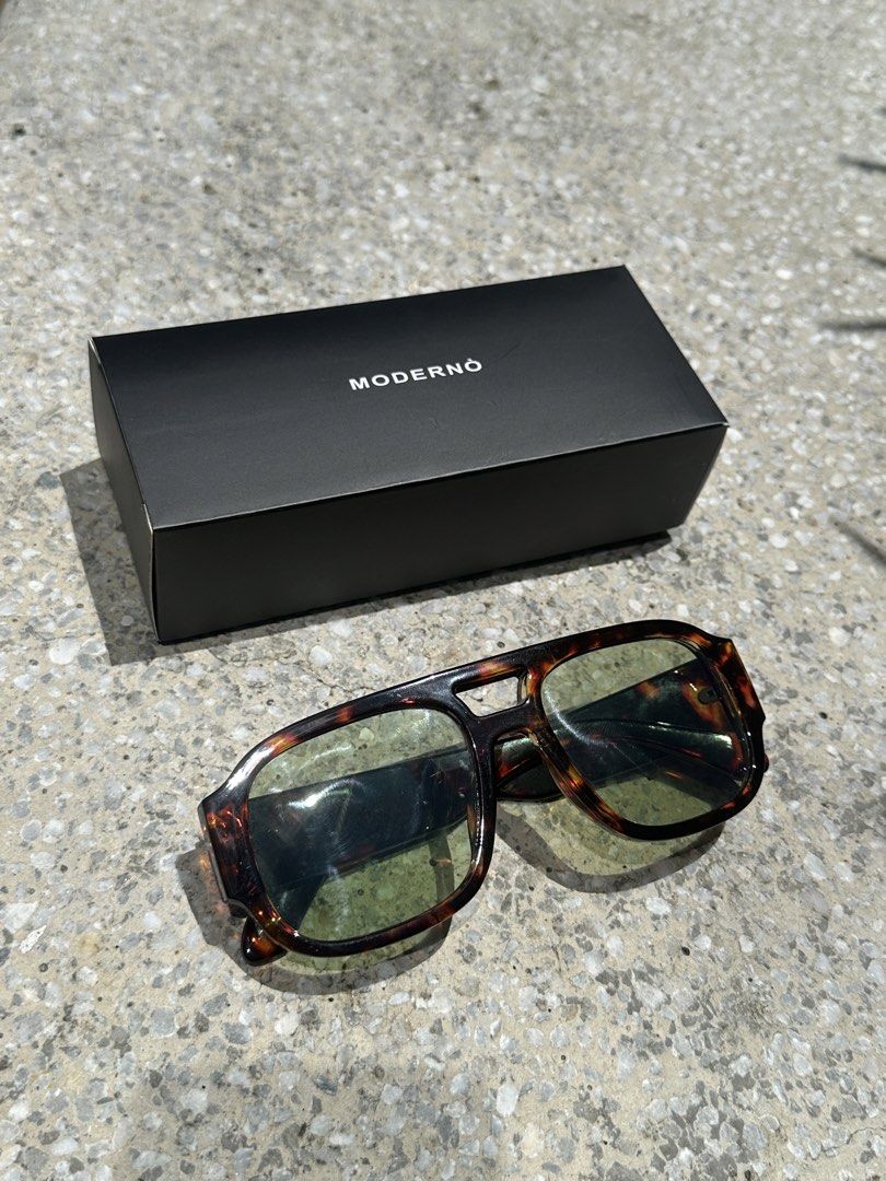 MODERNÒ Tortoiseshell Aviator Sunglasses (Category: Sunglasses & Eyewear) located in Pasig City. Submitted by AlbertCruz97 (Listing ID 1461365790, Image 2). Description: - Stylish tortoiseshell aviator sunglasses - Green tinted lenses - Comes with original MODERNÖ box - Ideal for sunny weather - A true statement piece - Ready for its new owner.