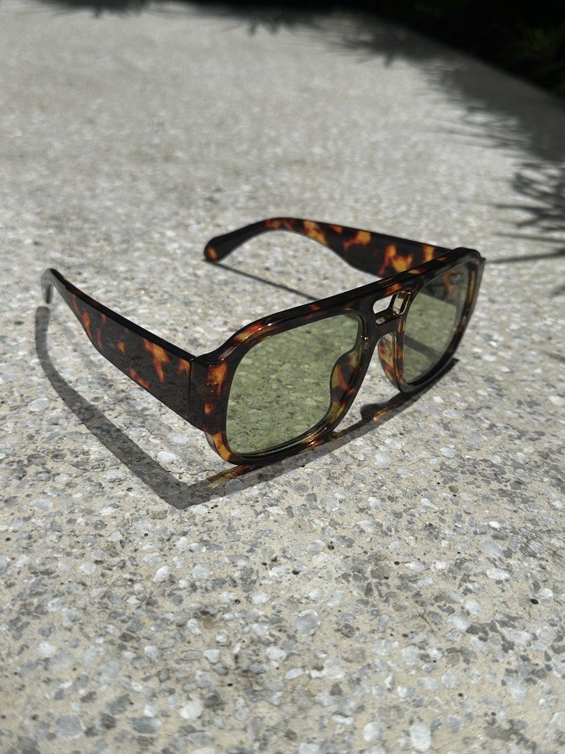 MODERNÒ Tortoiseshell Aviator Sunglasses (Category: Sunglasses & Eyewear) located in Pasig City. Submitted by AlbertCruz97 (Listing ID 1461365790, Image 1). Description: - Stylish tortoiseshell aviator sunglasses - Green tinted lenses - Comes with original MODERNÖ box - Ideal for sunny weather - A true statement piece - Ready for its new owner.