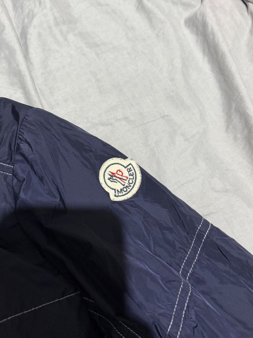 Moncler navy Alibert light jacket (Category: Coats, Jackets and Outerwear) located in Manila. Submitted by thra_shirts (Listing ID 1461422569, Image 3). Description: Moncler Navy Alibert Lightweight jacket Large frame W 23/L 26 Excellent condition Missing hoodie.