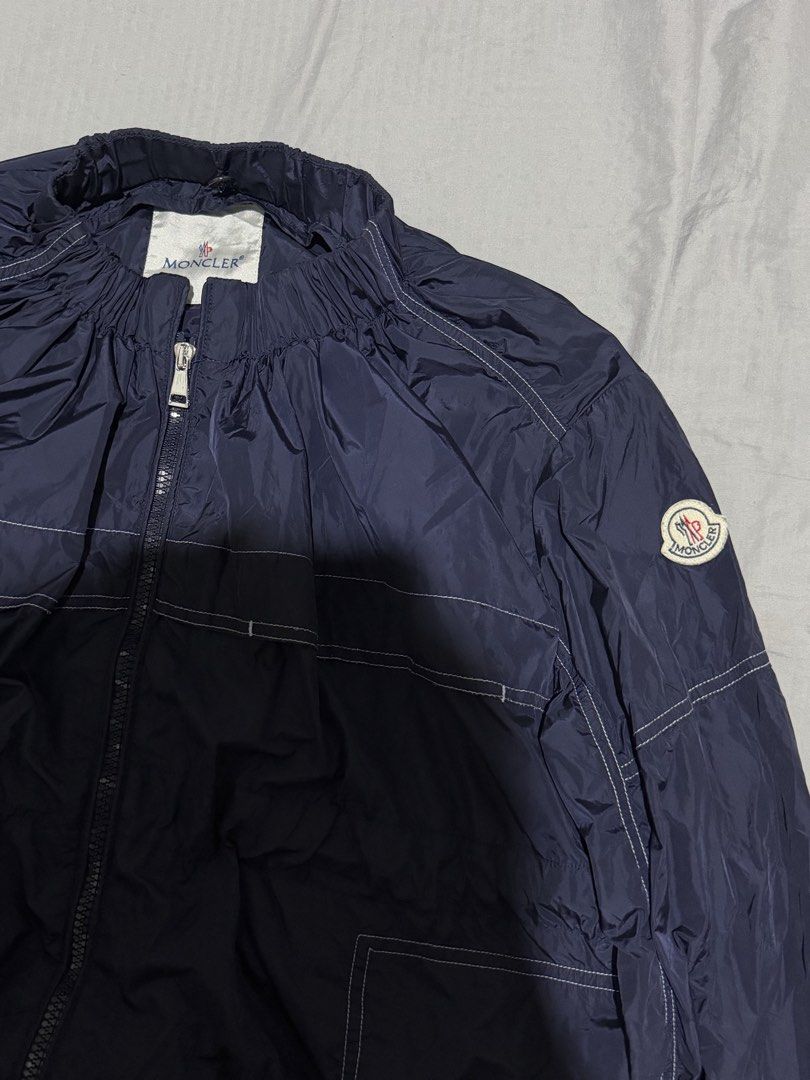 Moncler navy Alibert light jacket (Category: Coats, Jackets and Outerwear) located in Manila. Submitted by thra_shirts (Listing ID 1461422569, Image 2). Description: Moncler Navy Alibert Lightweight jacket Large frame W 23/L 26 Excellent condition Missing hoodie.
