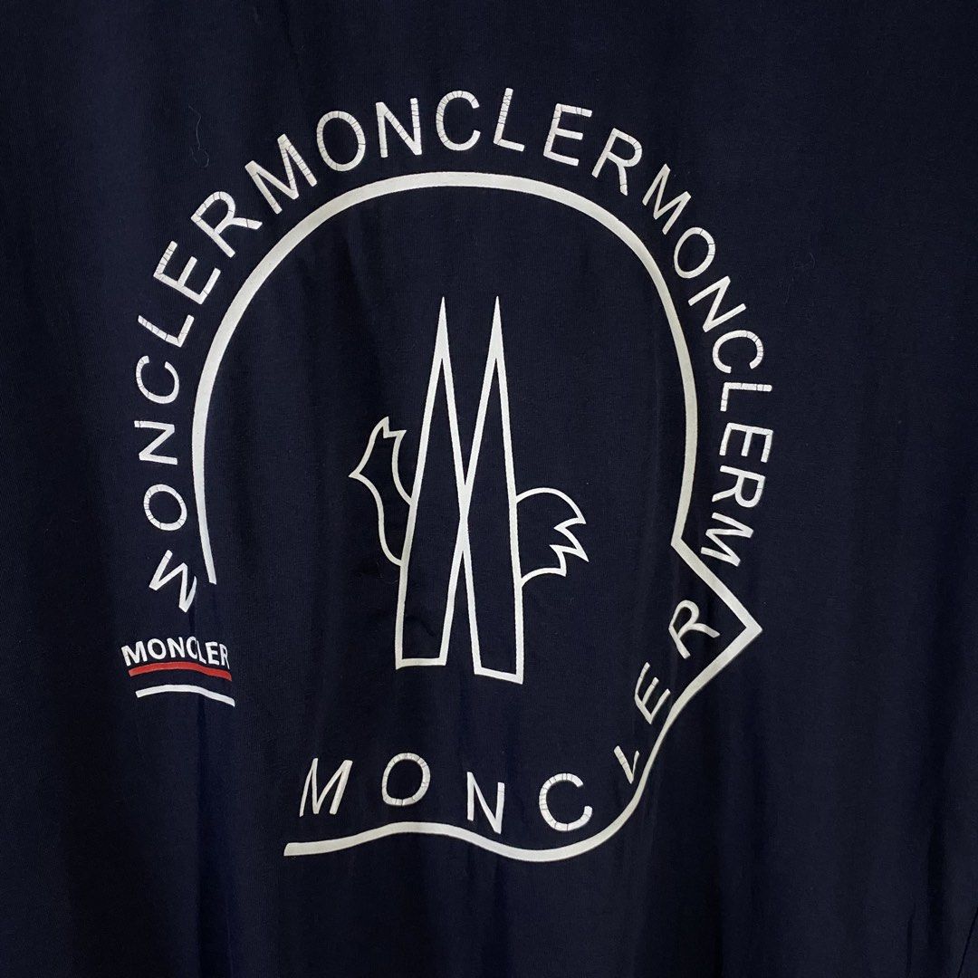 Moncler Shirt (Category: Tshirts & Polo Shirts ) located in Baguio. Submitted by goodfinds2600v2 (Listing ID 1461517937, Image 2). Description: Size on tag: XL fits M-L Dimensions: L-28 W/Bust-21.5 Description: unisex Condition: Very good Issue/s: print cracks, light discoloration on neckline .