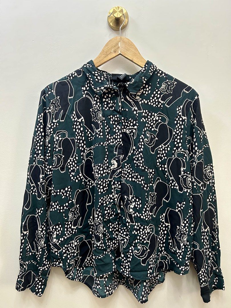 MONKL Polo Women (Category: Blouses) located in Mandaluyong City. Submitted by chic.picks (Listing ID 1461403750, Image 2). Description: - Actual Photo is 2nd Photo - Cool green button-up shirt - Unique black and white animal print - Long sleeves (can be rolled up) - Relaxed fit - Measurements: Width 24 inches, Height 23-26 inches - Versatile for casual or work wear or office blouse #Monkl #Zara #F21 #Uniqlo #H&M #PullandBear .