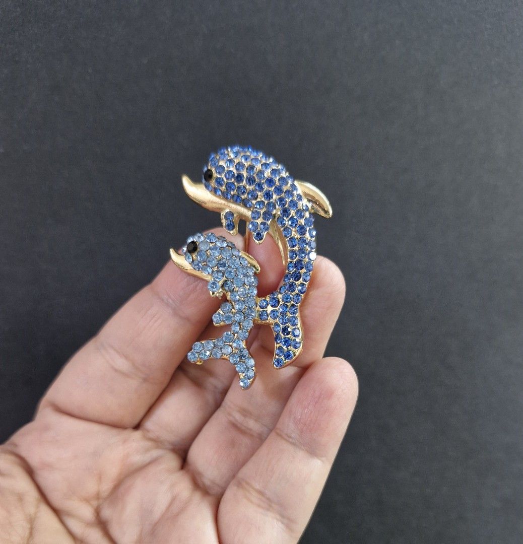 Mother & Child Dolphin Brooch (Category: Brooches) located in Taguig. Submitted by mommaschoice (Listing ID 1461362112, Image 2). Description: Brand New Adorned w/ Blue Rhinestones Lightweight won't damage the fabric Ships nationwide.
