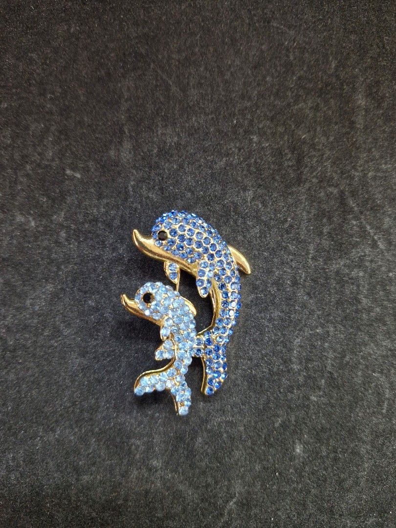 Mother & Child Dolphin Brooch (Category: Brooches) located in Taguig. Submitted by mommaschoice (Listing ID 1461362112, Image 1). Description: Brand New Adorned w/ Blue Rhinestones Lightweight won't damage the fabric Ships nationwide.