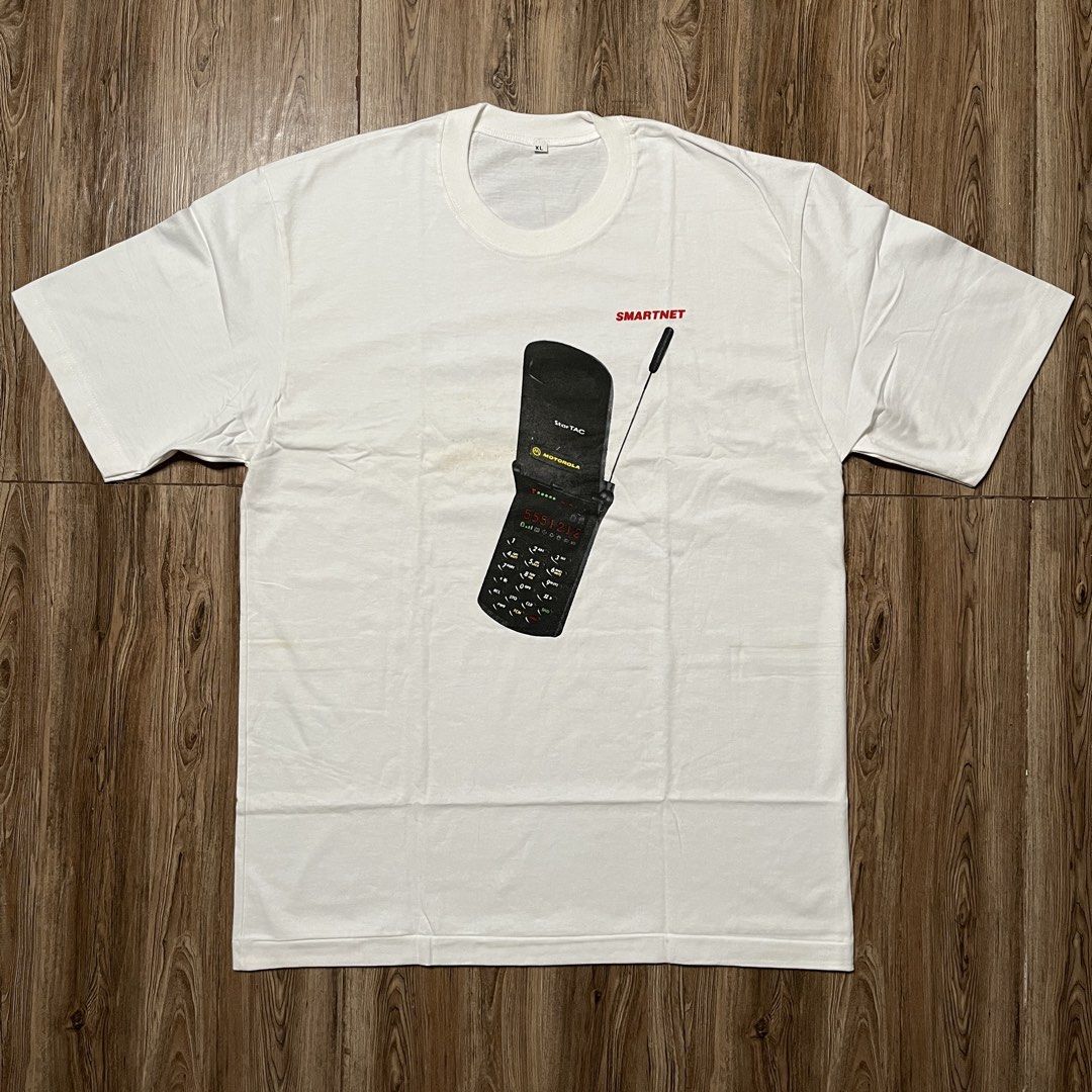Motorola Shirt (Category: Tshirts & Polo Shirts ) located in Marikina City. Submitted by wayupcollective (Listing ID 1461371025, Image 1). Description: Motorola Shirt ~ Size XL on tag ~ Good as new ~ Yellow stains Measurement Length: 29” Width: 21” .