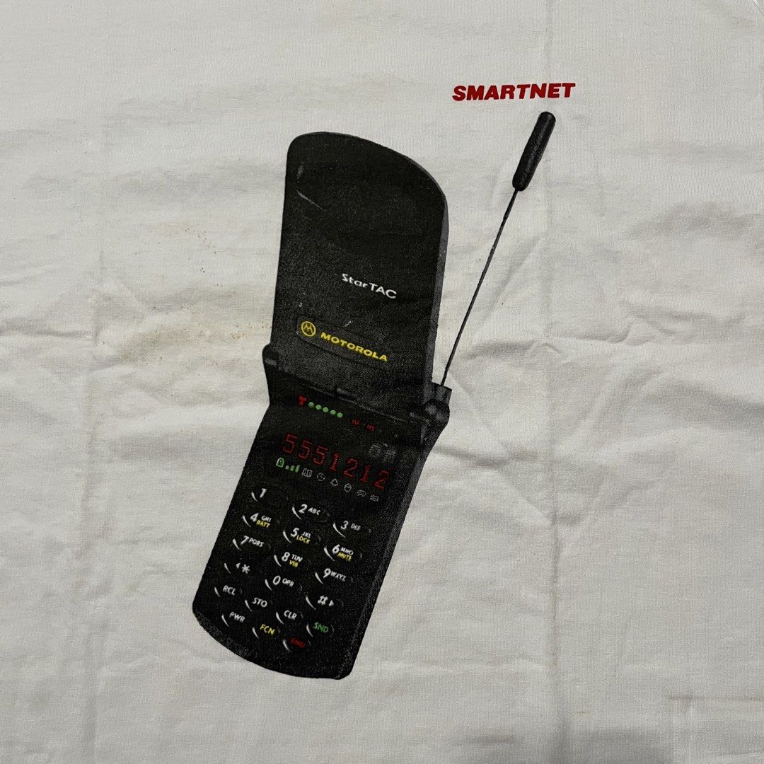 Motorola Shirt (Category: Tshirts & Polo Shirts ) located in Marikina City. Submitted by wayupcollective (Listing ID 1461371025, Image 3). Description: Motorola Shirt ~ Size XL on tag ~ Good as new ~ Yellow stains Measurement Length: 29” Width: 21” .