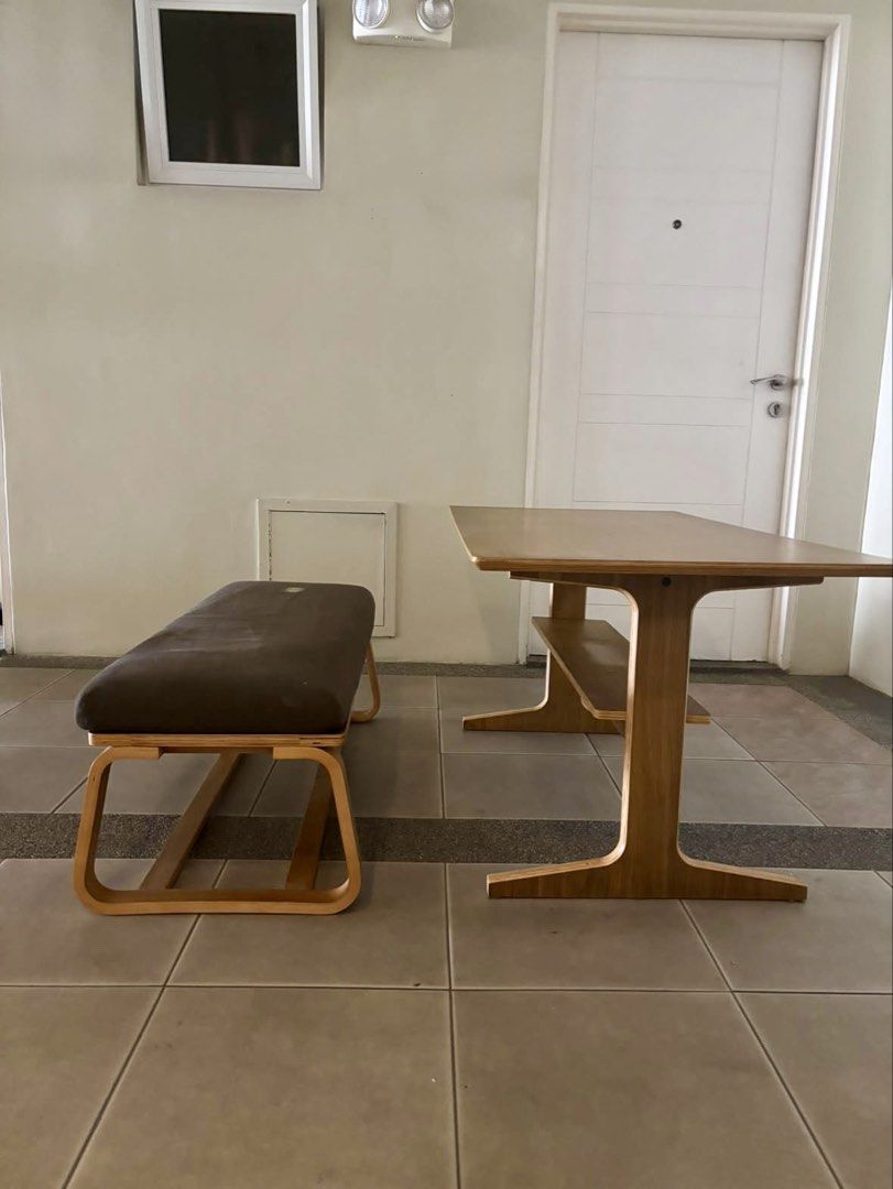 Muji Dining set (Category: Tables & Sets) located in Makati City. Submitted by staraby (Listing ID 1461561953, Image 1). Description: - Muji dining set - Wooden table with integrated shelf - Comfortable dark brown padded bench - Minimalist and modern design - Ideal for small dining areas - Meetup available in Pasig.