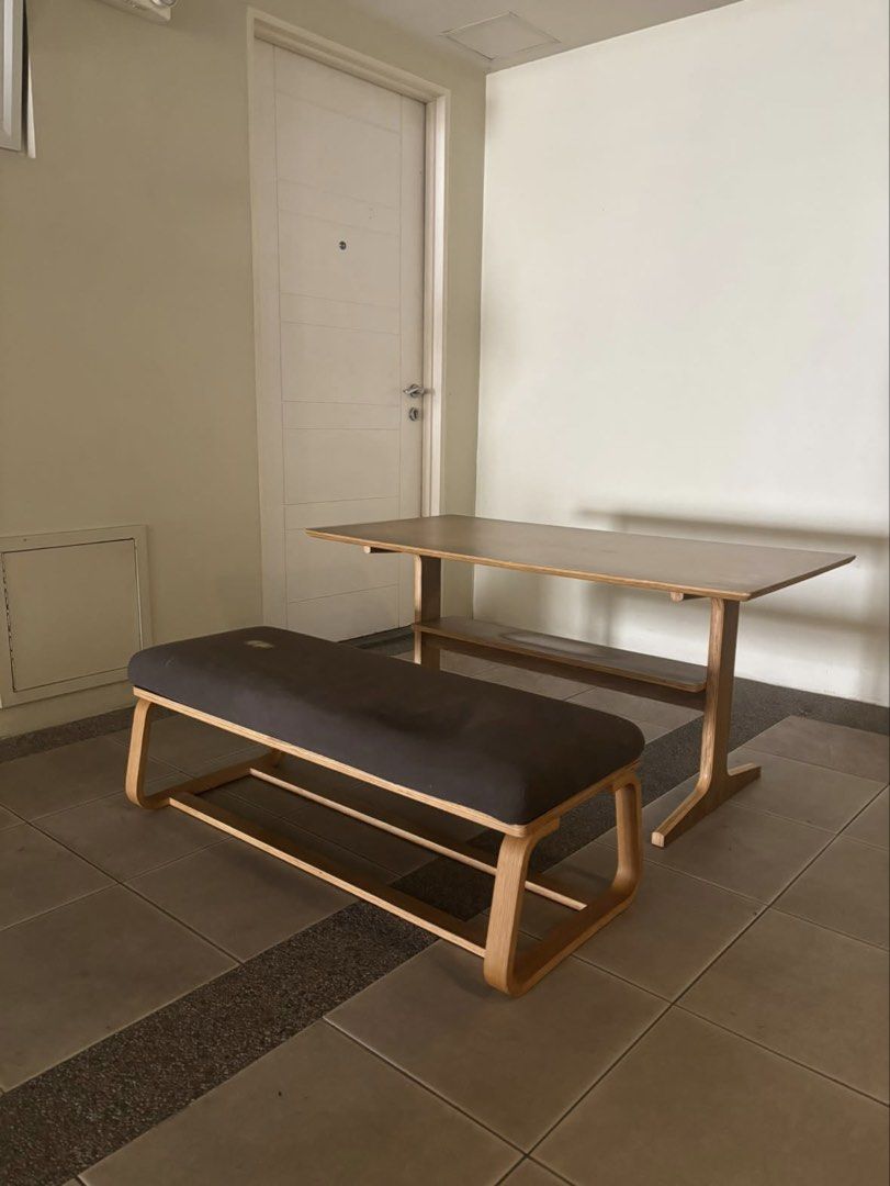 Muji Dining set (Category: Tables & Sets) located in Makati City. Submitted by staraby (Listing ID 1461561953, Image 3). Description: - Muji dining set - Wooden table with integrated shelf - Comfortable dark brown padded bench - Minimalist and modern design - Ideal for small dining areas - Meetup available in Pasig.