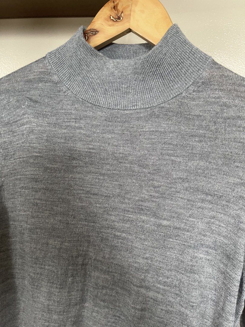 Muji high neck 100%wool sweater large (Category: Longsleeves) located in Quezon City. Submitted by booktt (Listing ID 1461362687, Image 3). Description: - large - A classic high neck sweater made of warm wool, with an extra soft texture for comfort around the neck and reducing itchiness. The fit is slightly relaxed, allowing you to layer with undershirts comfortably. Machine washable for convenient care at home..