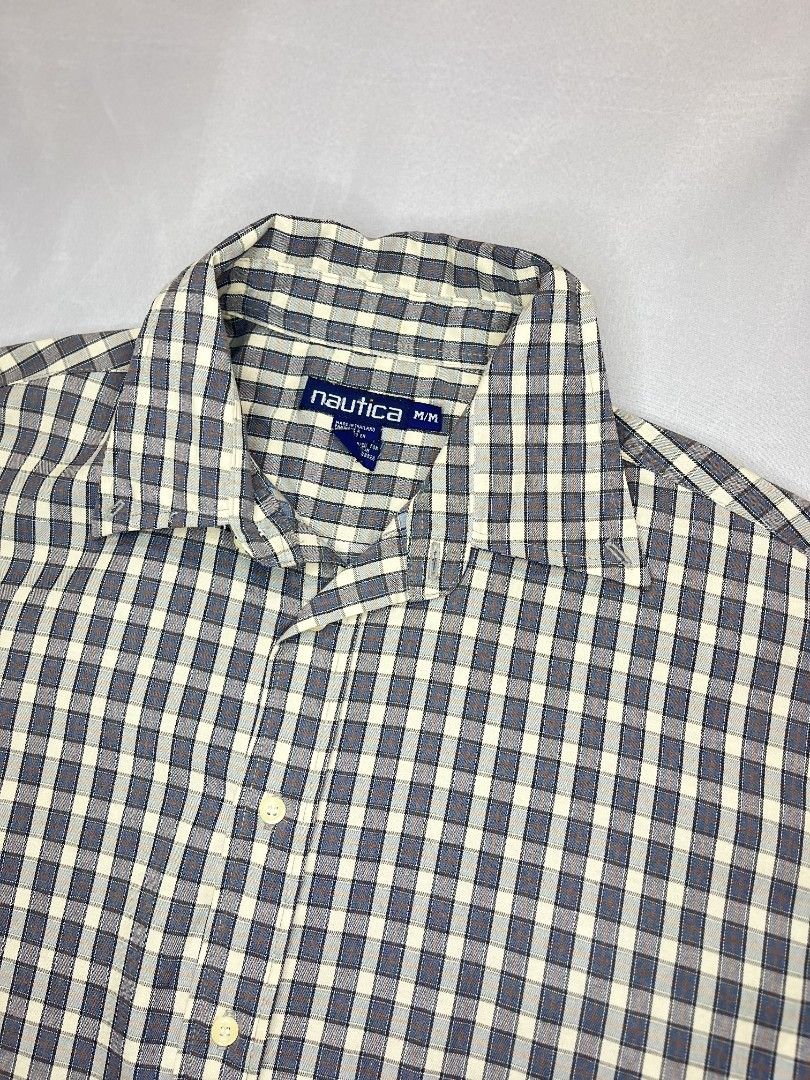 Nautica polo (Category: Tshirts & Polo Shirts ) located in Cabuyao City. Submitted by grand_vault (Listing ID 1461481527, Image 3). Description: Nautica Polo Size: M Width: 23 Length: 26 Condition: 8/10 Color rate: 10/10 Issue: Cut.
