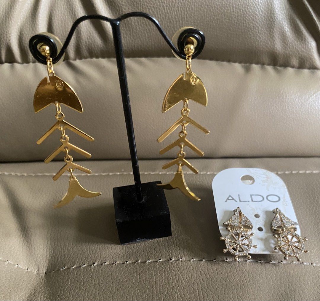 Nautical Earrings Bundle (2 Pairs) - ALDO Crystal + Gold Fishbone Dangle (Category: Earrings) located in Paranaque City. Submitted by ChloeCharles (Listing ID 1461516399, Image 1). Description: NAUTICAL EARRINGS BUNDLE - 2 PAIRS! ⚓️🐟✨ Get 2 trendy gold earrings for less than mall price! INCLUDES: 1. Gold Fish Skeleton Dangle Earrings (Statement Pair) • 3 inches long, articulated / movable • Gold-toned, lightweight & not heavy on ears • Quirky, a