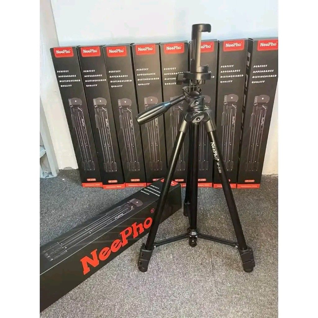 NeePho NP-3180 Professional Tripod (Category: Tripods & Monopods) located in Manila. Submitted by marvieobordo (Listing ID 1461382271, Image 2). Description: - NeePho NP-3180 Professional Tripod - Lightweight and portable for easy travel - Extends to a versatile height - Includes a convenient phone holder attachment - Sturdy construction for stable photography and videography.