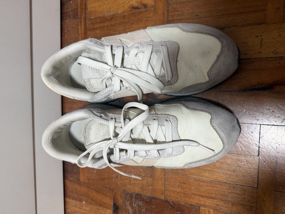 New Balance 237 Sneakers Beige Grey (Category: Sneakers) located in Pasig City. Submitted by mollyscloset123 (Listing ID 1461431451, Image 2). Description: - New Balance 237 Sneakers - Color: Beige and Grey - Size: US 8.5 / EU 40 - Upper Material: Suede and Textile - Laces: Intact - Sole: Shows some wear, still has good grip - Condition: Comfortable for everyday wear Price is negotiable .