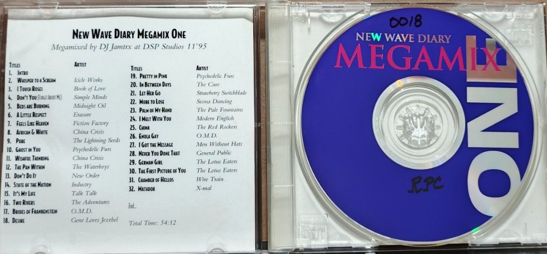 New Wave Diary Megamix One CD by DJ Jamtrx (Category: CDs & DVDs) located in Manila. Submitted by ruelcabrer77078 (Listing ID 1461546795, Image 2). Description: - New Wave Diary Megamix One CD - Megamixed by DJ Jamtrx at DSP Studios '95 - Features 32 New Wave hits - Includes tracks by The Cure, Erasure, Depeche Mode, and more - Total playtime: 54:12 - Perfect compilation for New Wave enthusiasts.