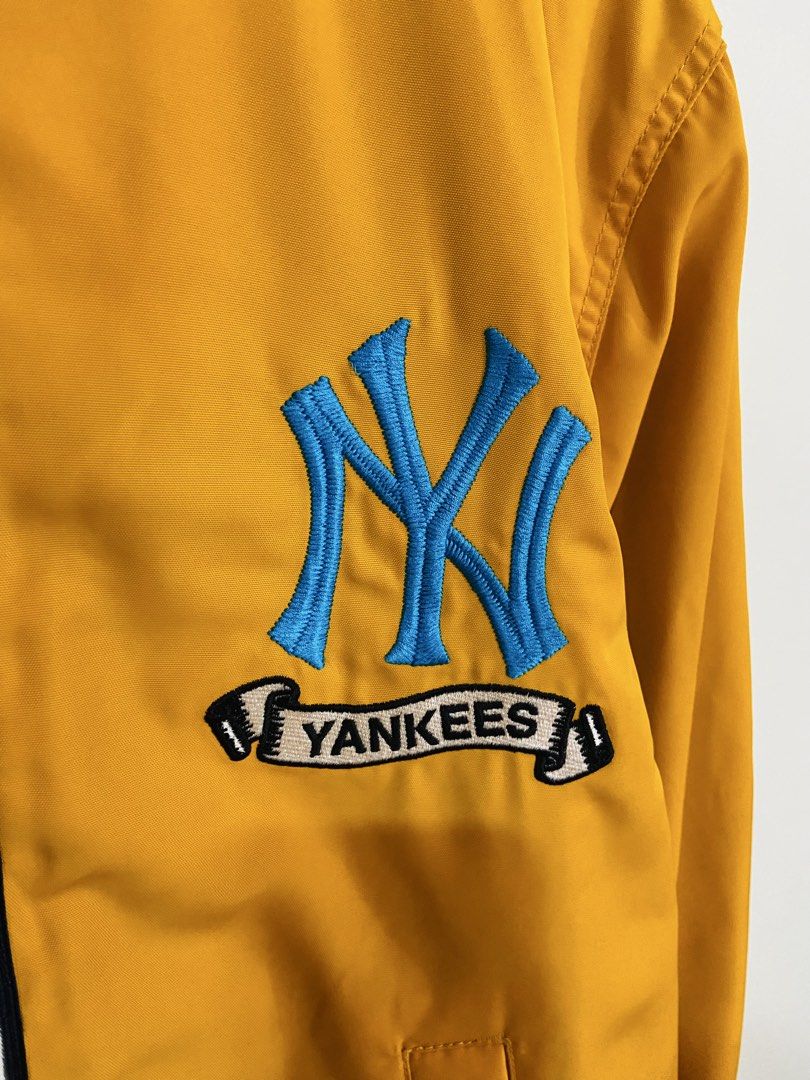 New York Yankees MLB Bomber Jacket Yellow (Category: Coats, Jackets and Outerwear) located in Manila. Submitted by thriftnijuan08 (Listing ID 1461344306, Image 3). Description: - Yellow bomber jacket - Official New York Yankees logo on front and back - Iconic NY logo on chest - 'Yankees' script on the back - Ribbed collar, cuffs, and hem for a snug fit - MLB branding on zipper pull - A must-have for any Yankees fan! -Dimes 23/26.