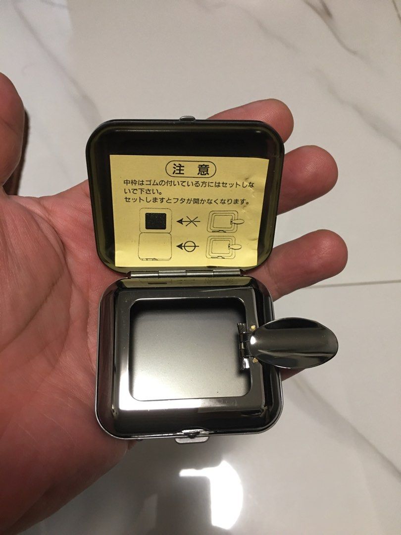 Nicole Portable Ashtray Pocket Ashtray (Category: Everything Else Others) located in Pasay City. Submitted by gilbertso62551 (Listing ID 1461386864, Image 1). Description: - Brand: Nicole - Material: Metal - Finish: Shiny - Feature: Flip-top lid - Size: Compact and portable - Ideal for: Personal use, on-the-go - Additional: Japanese instructions inside - As is,where is - Japan Surplus - Good condition .