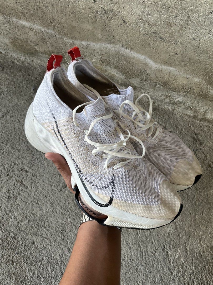 Nike Air Zoom Tempo NEXT% (Category: Sneakers) located in Adams. Submitted by princess.maggie (Listing ID 1461362027, Image 1). Description: Nike Air Zoom Tempo NEXT% - ukay source - size 9M - in good condition - check pics sa issue.
