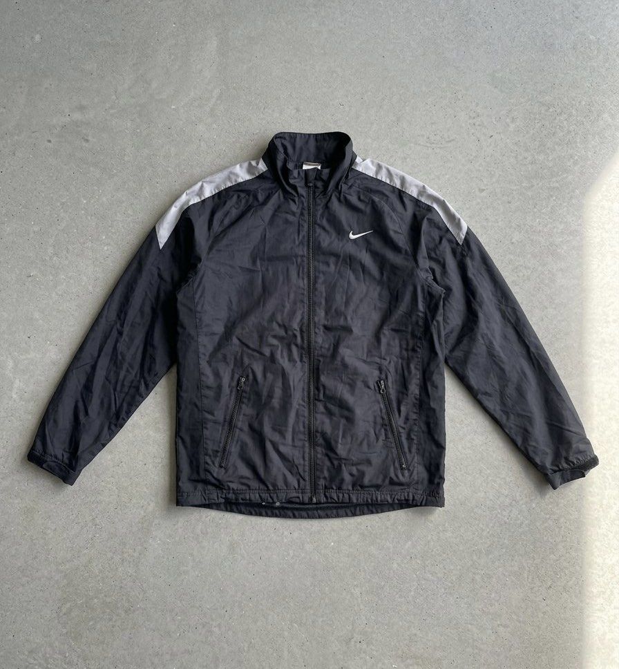 Nike Drill Nylon Track Jacket (Category: Coats, Jackets and Outerwear) located in Manila. Submitted by hiddenvaultph (Listing ID 1461362719, Image 1). Description: Black Nike track jacket Size: Medium on tag (True to size) Excellent condition Color rate: 9/10 Issue: Minimal pinhole (Needle size).
