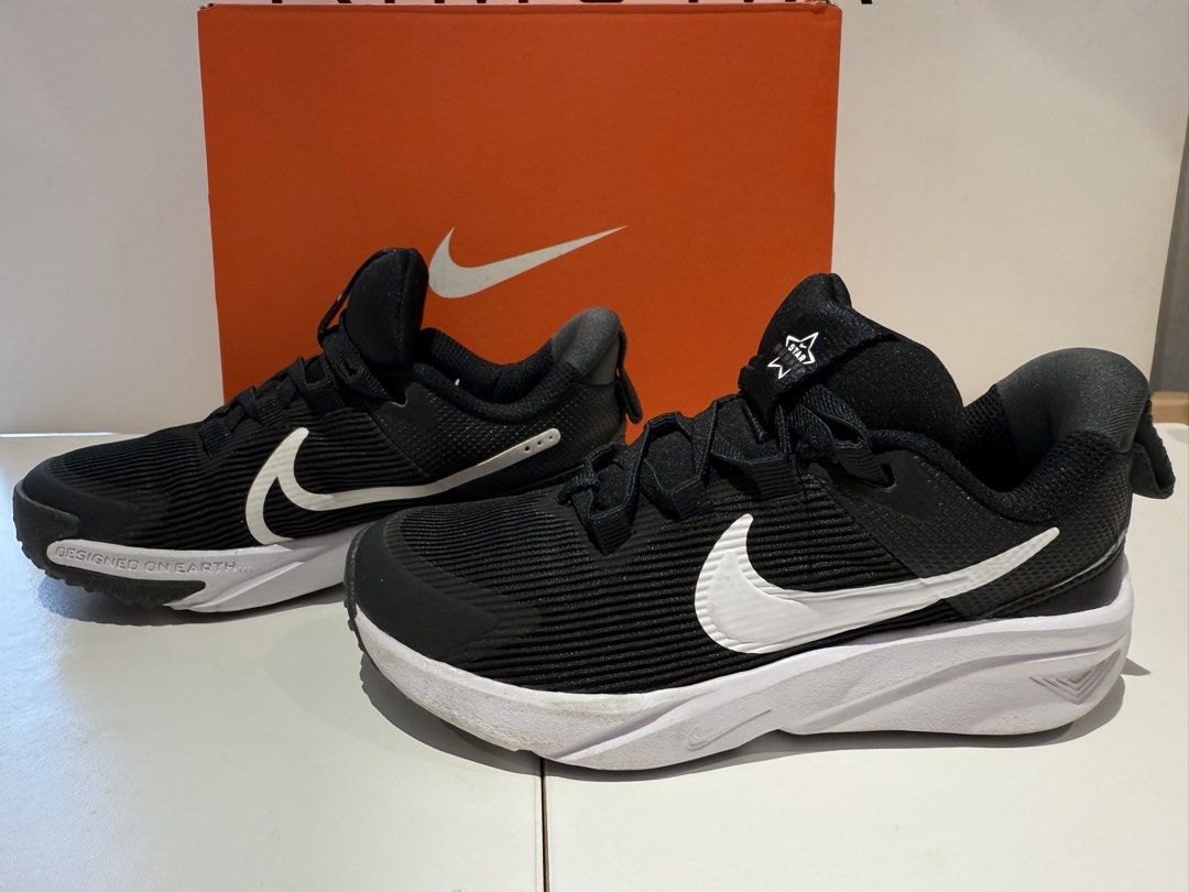 Nike Black White "Designed on Earth" Shoes with Box (Category: Babies & Kids Fashion) located in Paranaque City. Submitted by nurseviiij60533 (Listing ID 1461386284, Image 1). Description: Nike Star Runner 4 NN (PS) Color: Black / White Size: 12.5C / EUR 30 / 18.5 C Used but not abused. Still in excellent used condition. Comes with the original Nike box.