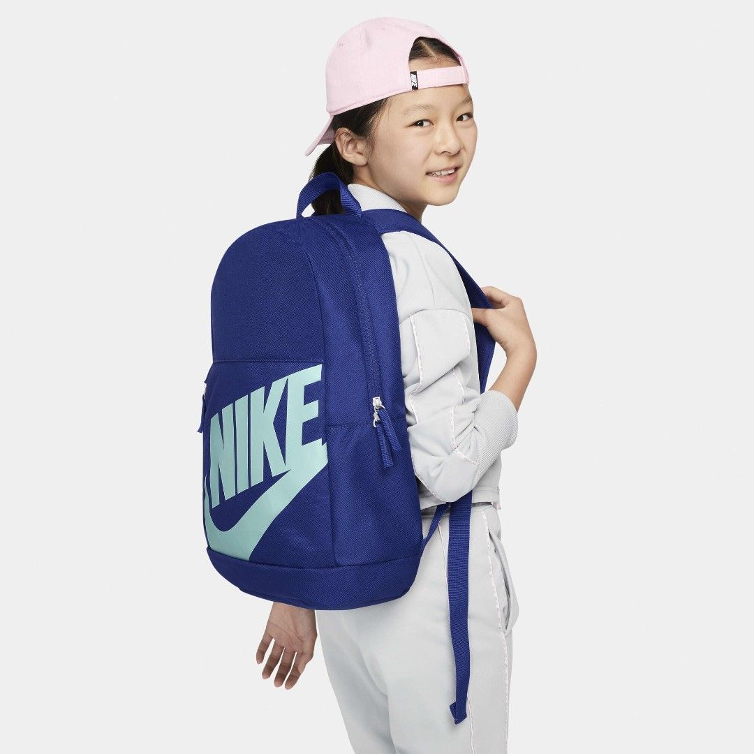 Nike Blue Backpack with Large Logo (Category: Backpacks) located in Mandaluyong City. Submitted by swiftbird_ed6c34 (Listing ID 1461413864, Image 3). Description: - Blue Nike backpack - Large light blue Nike logo on front - Zippered front pocket - Spacious main compartment - Adjustable straps - Perfect for school or daily use - Comes with original tags.
