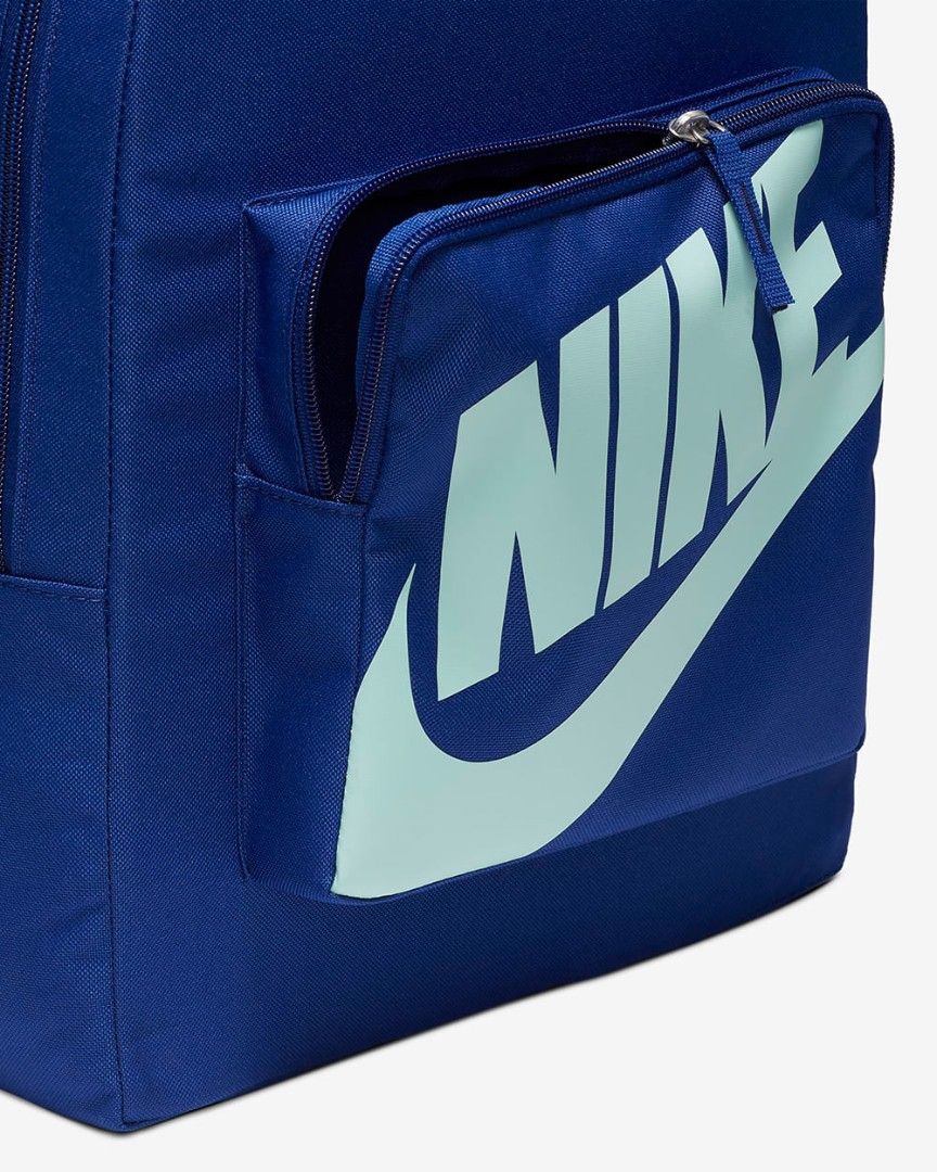 Nike Blue Backpack with Large Logo (Category: Backpacks) located in Mandaluyong City. Submitted by swiftbird_ed6c34 (Listing ID 1461413864, Image 2). Description: - Blue Nike backpack - Large light blue Nike logo on front - Zippered front pocket - Spacious main compartment - Adjustable straps - Perfect for school or daily use - Comes with original tags.