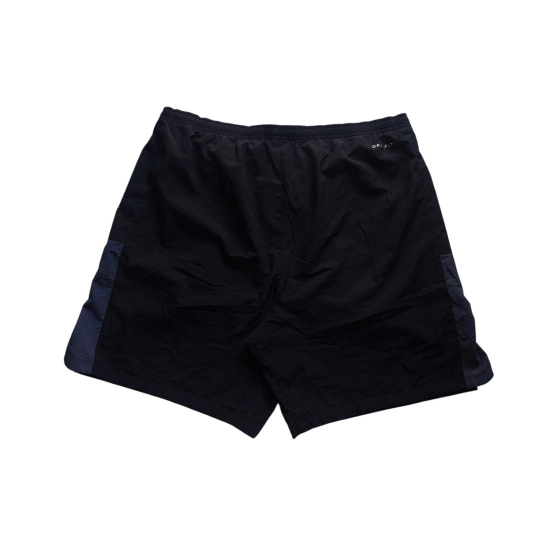 Nike Dri-Fit Running Shorts (Category: Activewear) located in Quezon City. Submitted by y3thriftshop (Listing ID 1461562217, Image 2). Description: Tag: Nike Dri-Fit Running Shorts Color : Black Size : XXL on Tag Dimension : 36-38x18 Leg Opening : 13 Condition : Good Color Rate : 9/10 Price : P499.00 Issue : none RFS : Buy and Sell Additional Information : - 2 Side Pockets Please read: - Color may vary due to lighting - Check dimension indicated 