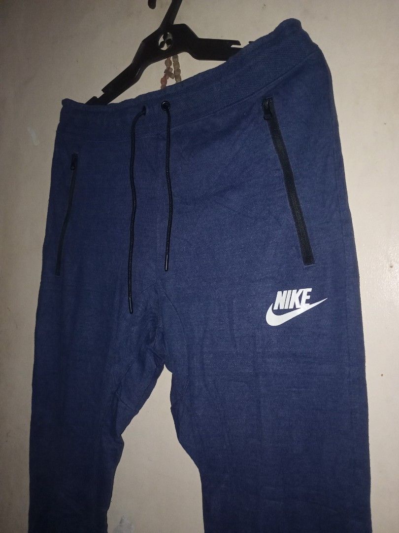 Nike fleece jogger pants (Category: Joggers) located in Manila. Submitted by kenny200024 (Listing ID 1461487263, Image 1). Description: Nike fleece jogger pants - size medium - actual measurement waistline 30-36 width 15 | length 36.5 - excellent condition.