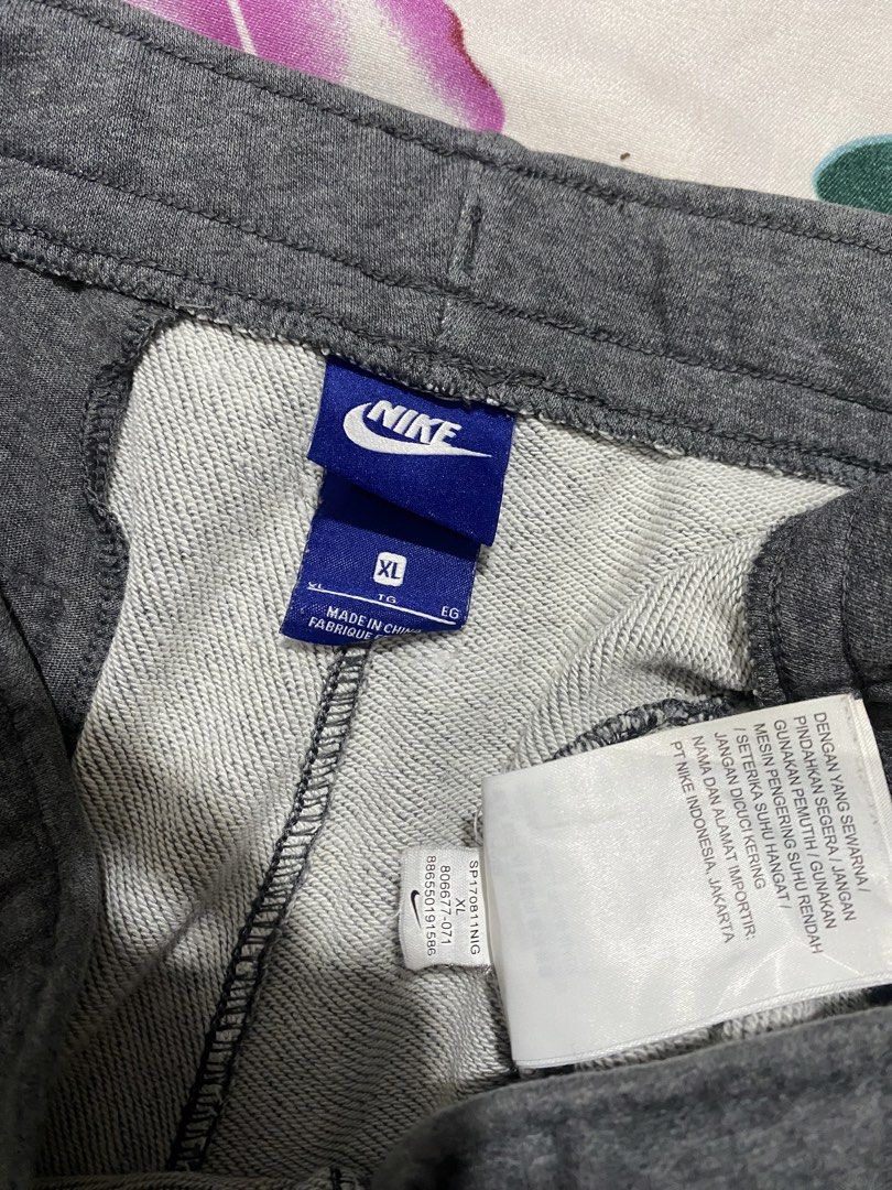 Nike Grey Sweatpants Joggers Size XL (Category: Joggers) located in Las Pinas. Submitted by johnpaul2525 (Listing ID 1461325853, Image 3). Description: - Grey Nike sweatpants - Size XL - Elastic waistband with drawstring - Ideal for casual wear or lounging.