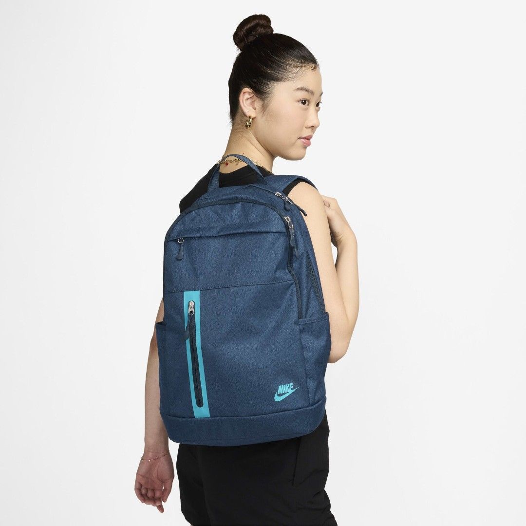 Nike Navy Blue Backpack (Category: Backpacks) located in Mandaluyong City. Submitted by swiftbird_ed6c34 (Listing ID 1461415558, Image 3). Description: - Navy blue Nike backpack - Front zip pocket with teal accent - Side pocket for water bottle - Padded straps for comfort - Spacious interior - Ideal for school or everyday use.