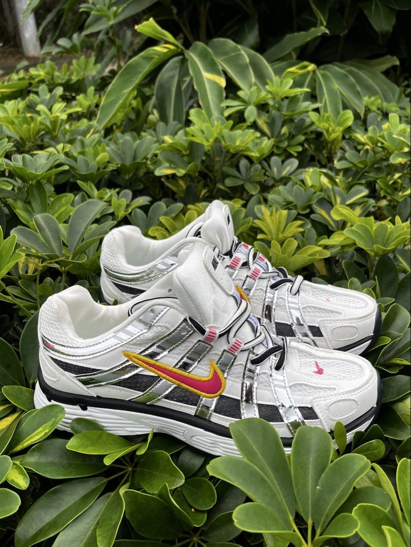 Nike P-6000 Metallic Silver Pink Yellow (Category: Sneakers) located in Manila. Submitted by organicshoe (Listing ID 1461336293, Image 3). Description: - Nike P-6000 sneakers - Metallic silver colorway - Pink and yellow accents on the swoosh - Classic running shoe silhouette - Ideal for everyday wear or a sporty look - Features black and white laces (DIRECT MESSAGE FOR MORE DETAILED IMAGES).