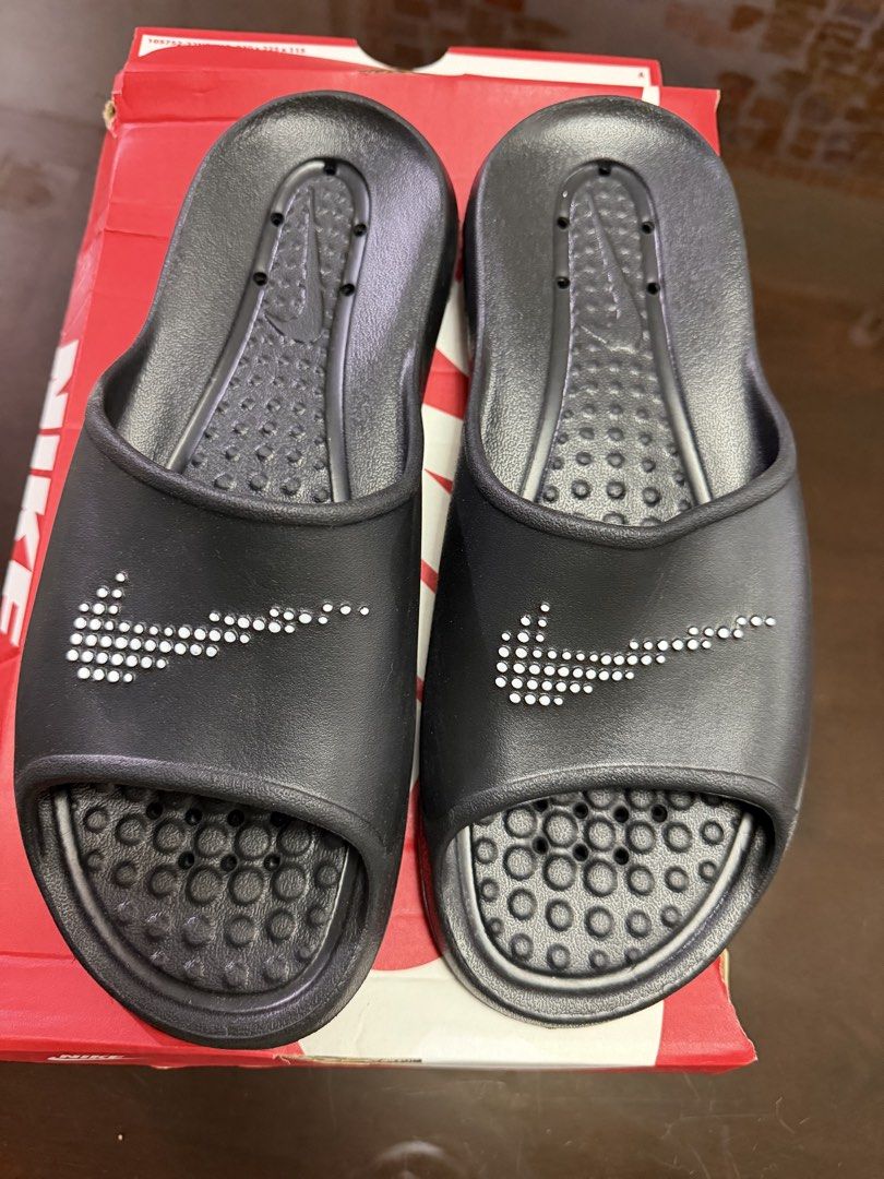 Nike Slippers (Category: Slippers & Slides) located in Bulacan. Submitted by ellehcco (Listing ID 1461455301, Image 1). Description: Brand New! Bought from Nike Store Online RFS: wrong size authentic bought for 1,045 selling for 800 only.