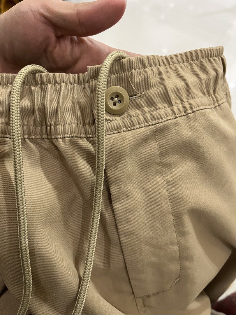 Nike tapered pants (Category: Activewear) located in Cabuyao City. Submitted by allorigz (Listing ID 1461456426, Image 2). Description: Nike tapered pants original Beige color 9/10 condition used Strechable waist w/ draw string Polyester fabric .