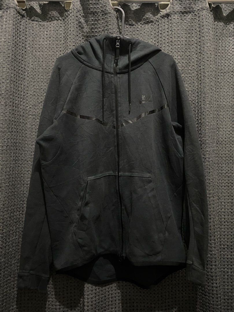 Nike Tech Fleece Full Zip Hoodie (Category: Coats, Jackets and Outerwear) located in Manila. Submitted by _flipdd (Listing ID 1461461638, Image 1). Description: - Classic Nike Tech Fleece hoodie - Full zip closure with hood - Signature Nike Swoosh logo and tape detailing - Two convenient front pockets - Ideal for everyday wear or workouts.