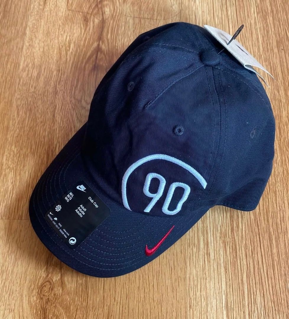 Nike Total 90 Club Unstructured Cap (Category: Caps & Hats) located in Manila. Submitted by samanthabgm (Listing ID 1461439582, Image 1). Description: - Classic black Nike cap - Features Total 90 branding on the strap - Adjustable strap at the back for a customized fit - Iconic Nike logo displayed on the side - Versatile for both sports and casual outfits.