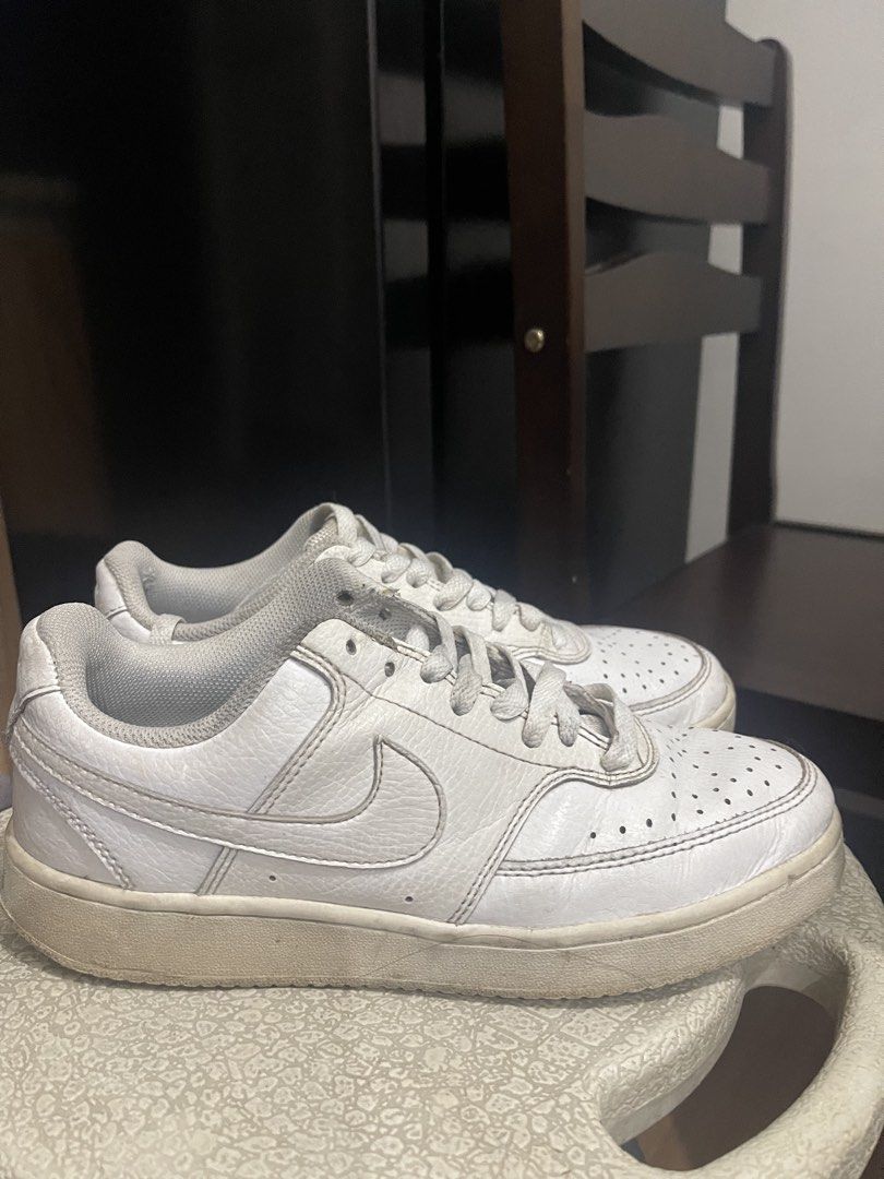 Nike White Sneaker 7.5 US (Category: Sneakers) located in Manila. Submitted by victoria.shop1 (Listing ID 1461533741, Image 1). Description: Legit Nike White Sneaker SIZE 7.5 Wala pa naman defects may sign of usage and stain Bought at taiwan..