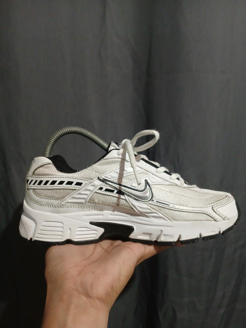 Nike White Sneakers (Category: Sneakers) located in Dipolog. Submitted by 19ninetythrift (Listing ID 1461503977, Image 2). Description: - Classic white Nike sneakers - Black accent details - Perfect for everyday wear - White laces - Black and white sole with good grip.