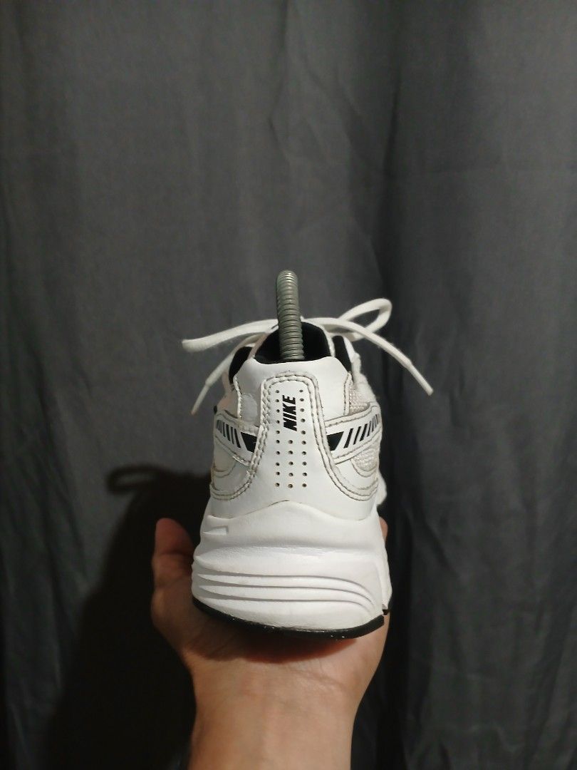 Nike White Sneakers (Category: Sneakers) located in Dipolog. Submitted by 19ninetythrift (Listing ID 1461503977, Image 3). Description: - Classic white Nike sneakers - Black accent details - Perfect for everyday wear - White laces - Black and white sole with good grip.