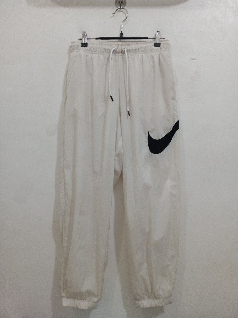 Nike Womens Woven Pants (Category: Other Bottoms) located in Taytay. Submitted by leanmark103093 (Listing ID 1461509230, Image 2). Description: NAYKEe Woven Jogger Pants Size Medium on tag 30 to 34 Waistline 36 Length Excellent Condition No issue 📩📩📩📩.