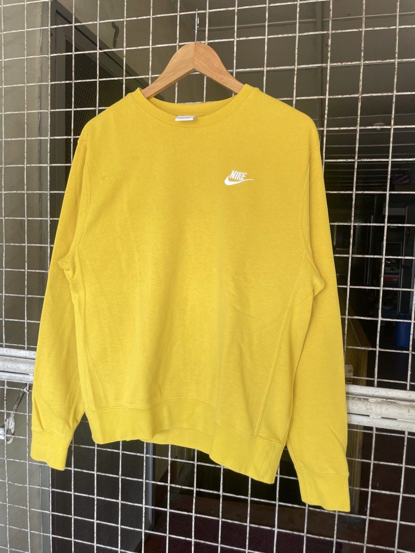 Nike Yellow Crewneck Sweatshirt Size S (Category: Coats, Jackets and Outerwear) located in Manila. Submitted by oftherack_04 (Listing ID 1461461382, Image 2). Description: - Yellow Nike crewneck sweatshirt - Small white Nike logo on the chest - Tag size: S, P, CH (fits like a typical S) - Made in China - Ideal for casual everyday wear.