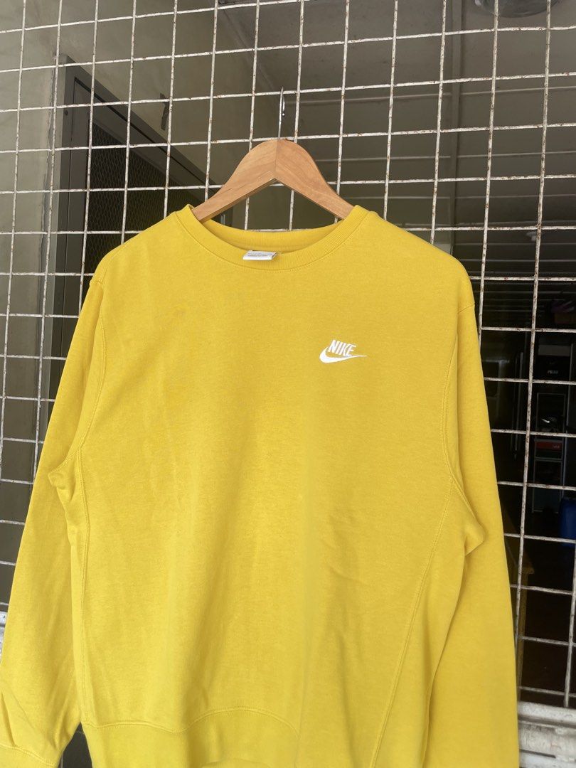 Nike Yellow Crewneck Sweatshirt Size S (Category: Coats, Jackets and Outerwear) located in Manila. Submitted by oftherack_04 (Listing ID 1461461382, Image 3). Description: - Yellow Nike crewneck sweatshirt - Small white Nike logo on the chest - Tag size: S, P, CH (fits like a typical S) - Made in China - Ideal for casual everyday wear.