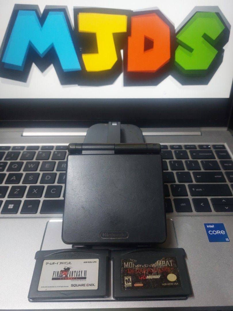 Nintendo Game Boy Advance SP AGS-101 (Category: Nintendo) located in Quezon City. Submitted by kushala140 (Listing ID 1461546303, Image 3). Description: GameBoy Advance SP AGS-101 Graphite Tested Working Good All Buttons Good Sound Good Charging Good Cartridge Slot Good LCD may parang red sa paligid pero visible pa ung image pag dark lang kita ung red With Games 2pcs Original Games No charger Check out pictures for more details No Warranty Test2s