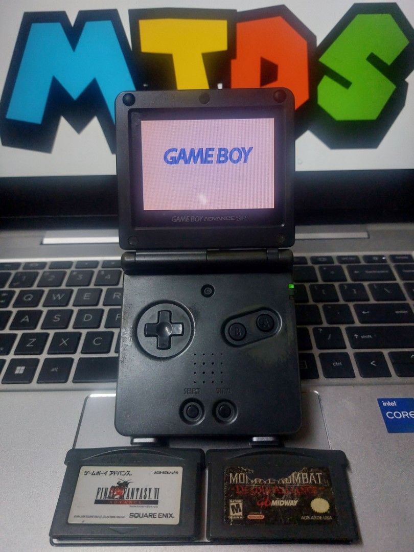 Nintendo Game Boy Advance SP AGS-101 (Category: Nintendo) located in Quezon City. Submitted by kushala140 (Listing ID 1461546303, Image 2). Description: GameBoy Advance SP AGS-101 Graphite Tested Working Good All Buttons Good Sound Good Charging Good Cartridge Slot Good LCD may parang red sa paligid pero visible pa ung image pag dark lang kita ung red With Games 2pcs Original Games No charger Check out pictures for more details No Warranty Test2s