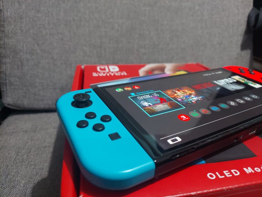 NINTENDO SWITCH OLED COMPLETE W/ 256GB SD CARD & 10+ INSTALLED GAMES (Category: Nintendo) located in Santa Rosa. Submitted by agentred1142 (Listing ID 1461558971, Image 3). Description: NINTENDO SWITCH OLED COMPLETE W/ 256GB SD CARD & 10+ INSTALLED GAMES Non JB. Good condition. 64GB internal plus 256GB SD CARD. Test all you want upon meet up. 99% smooth. Long battery. NO SD CARD included. D ka na bibili ng games sa dami ng naka install. 13,000 FI