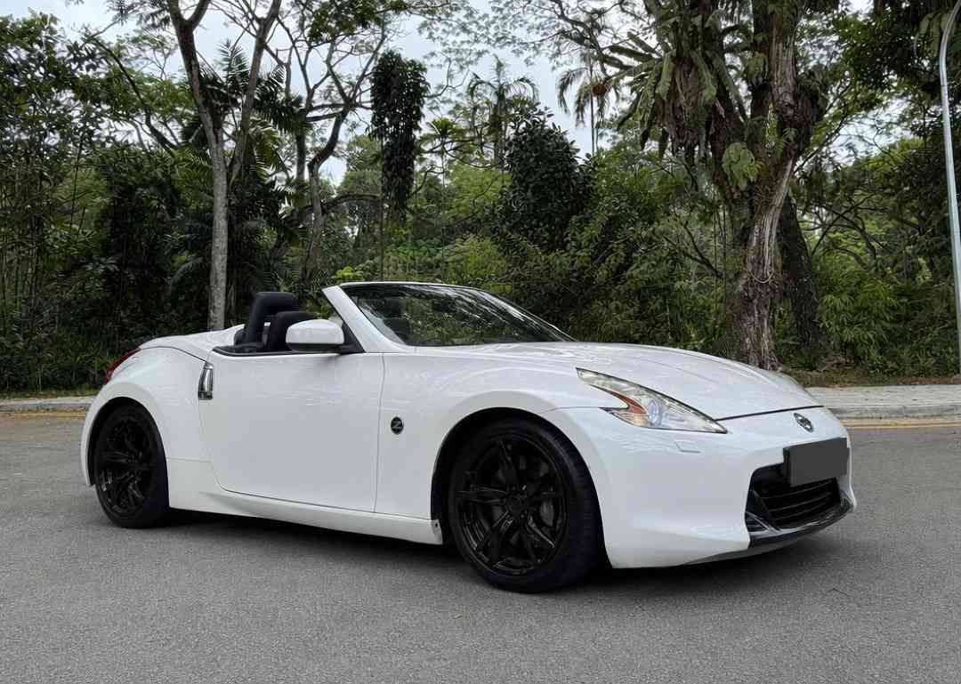 Nissan Fairlady 370Z Roadster (Category: Used Cars) located in Singapore. Submitted by carousell_certified_partners (Listing ID 1461469403, Image 1). Description: Stock conditioned unit up for grabs! Well maintained unit with all components still working fine! Excellent choice for car enthusiasts without breaking the bank! Flexible financing options available with high trade in quotes! Contact us today for no obligation viewing today! Features: 3