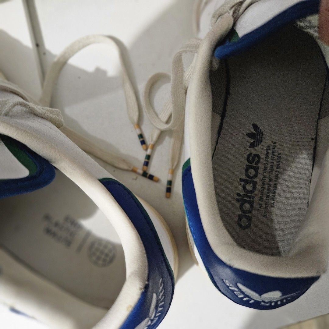 OG Adidas Stan Smith US M7.5 (Category: Casual Shoes) located in Pasay City. Submitted by pass.it.on.ph (Listing ID 1461412688, Image 3). Description: Adidas Stan Smith US M7. 5 EU40 2/3 Colorway: Cloud White / Off White / Gum (featuring layered Blue and Green heel/tongue details) RFS: decluttering _________________________________________________________ ​🛍️ Check my profile for more listings! 💡 Take 2 or more items to get a discount/bundle pr