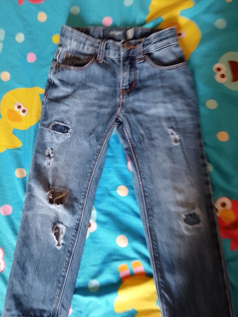 Old Navy Boys' Distressed Jeans Size 4T (Category: Babies & Kids Fashion) located in Paranaque City. Submitted by lee_oj (Listing ID 1461352802, Image 1). Description: - Brand: Old Navy - Size: 4T - Color: Blue Denim - Style: Distressed/Ripped legs - Closure: Button and zip - Features: Adjustable waist inside - Perfect for: Everyday wear - Condition: Please check photos for details on rips. -Measurement: see photos RFS - OUTGROWN -cute in person.