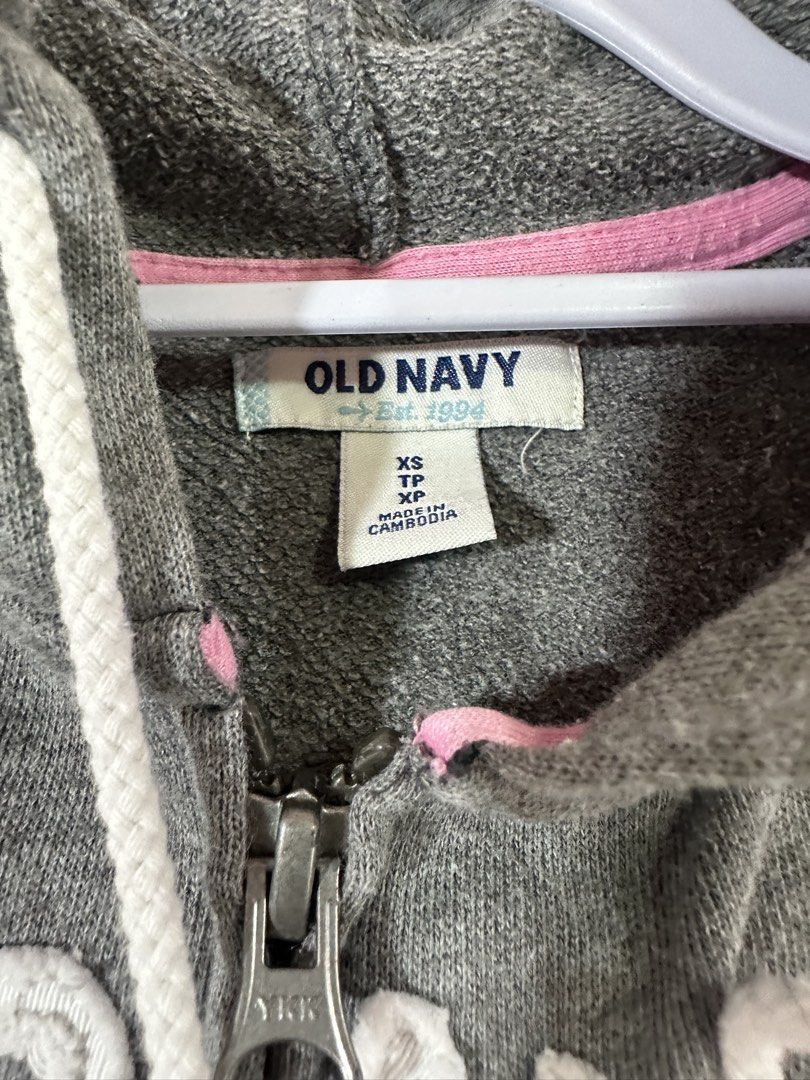 Old Navy Grey Zip-Up Hoodie (Category: Hoodies) located in Quezon City. Submitted by snowrukia (Listing ID 1461429511, Image 3). Description: - Grey Old Navy zip-up hoodie - Size XS - Features a wave graphic with 'Daytona Beach, FL' text - Long sleeves with ribbed cuffs and hem - Two front pockets - Made in Cambodia.