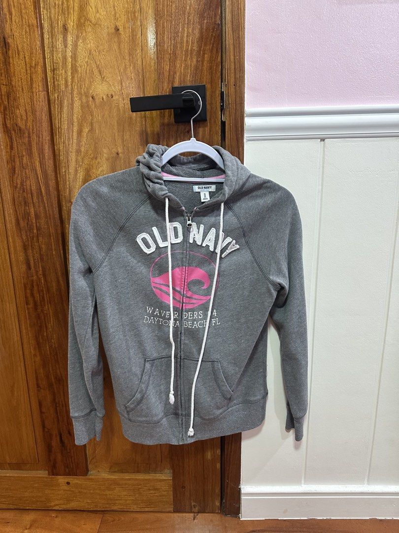 Old Navy Grey Zip-Up Hoodie (Category: Hoodies) located in Quezon City. Submitted by snowrukia (Listing ID 1461429511, Image 1). Description: - Grey Old Navy zip-up hoodie - Size XS - Features a wave graphic with 'Daytona Beach, FL' text - Long sleeves with ribbed cuffs and hem - Two front pockets - Made in Cambodia.
