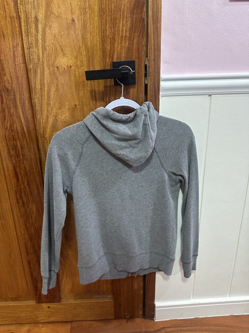 Old Navy Grey Zip-Up Hoodie (Category: Hoodies) located in Quezon City. Submitted by snowrukia (Listing ID 1461429511, Image 2). Description: - Grey Old Navy zip-up hoodie - Size XS - Features a wave graphic with 'Daytona Beach, FL' text - Long sleeves with ribbed cuffs and hem - Two front pockets - Made in Cambodia.